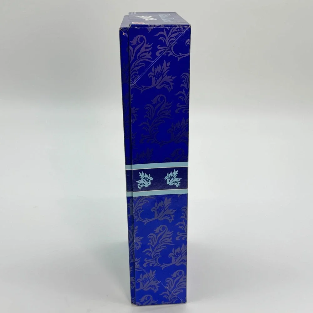 Avon Winter Velvet Barbie Special Edition 1995 First in Series Blue Silver 15571
